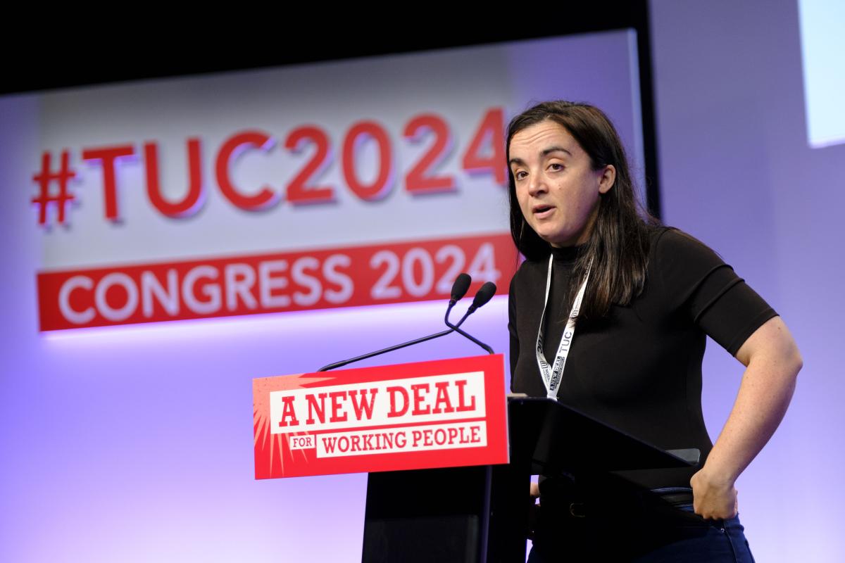 A photograph of Lucy at the TUC podium.  (R) Jess Hurd.